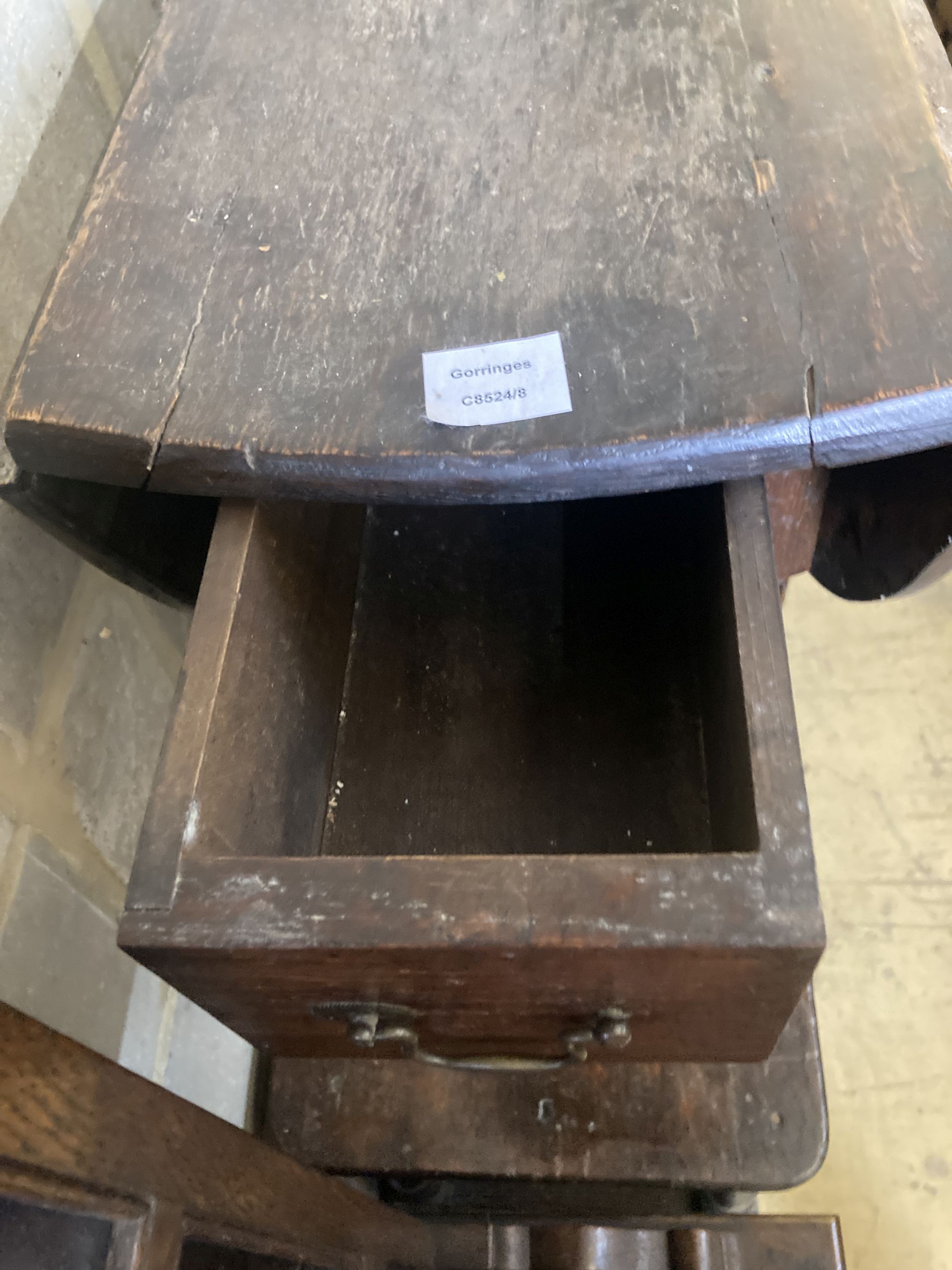 A small 18th century oak oval-topped gateleg table, width 83cm, length 96cm extended, height 62cm